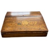 An early 20th century mahogany writing slope, with inlaid floral decoration and green leather