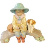 Lladro group of a young boy fishing from a bridge with dog by his side, 28cm long