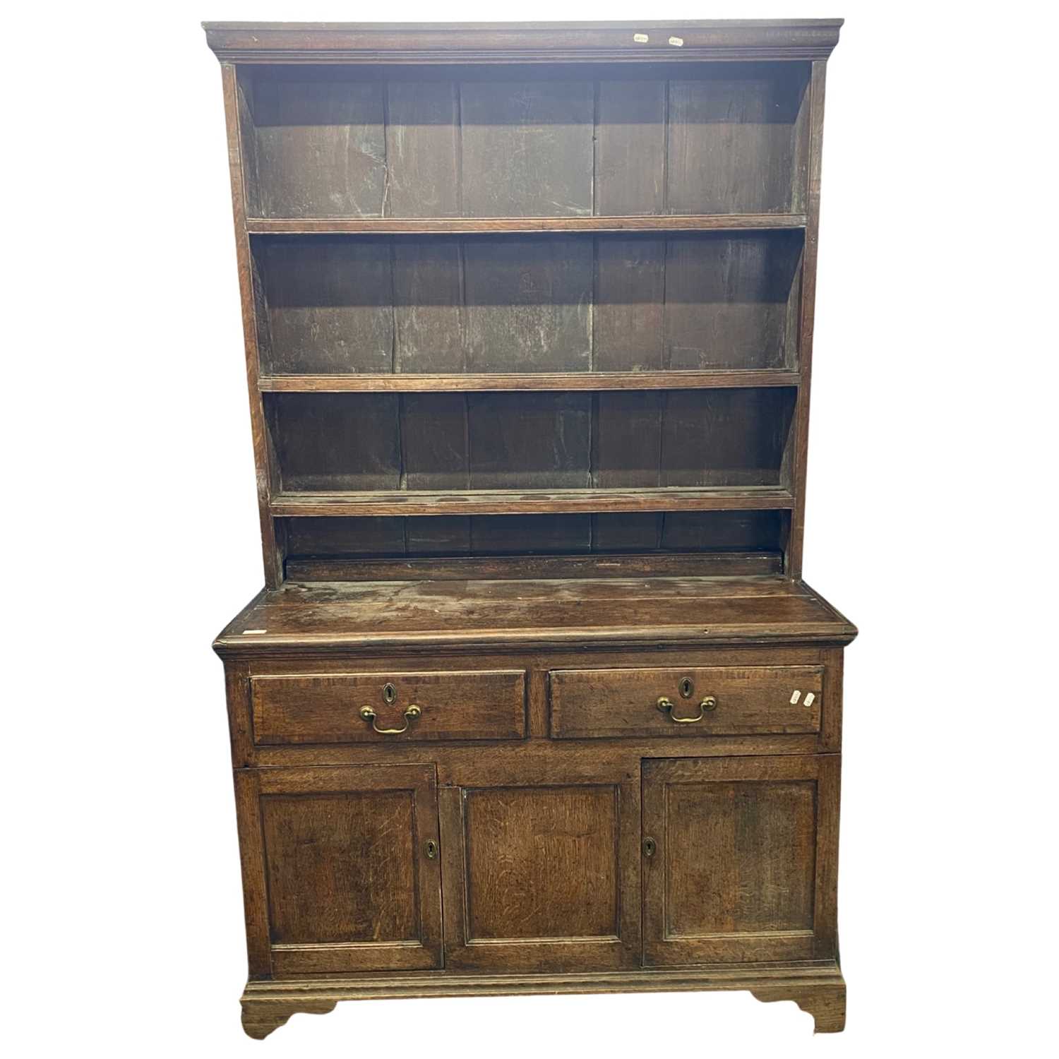 Georgian oak dresser with shelved back over a base with two drawers and two panelled doors raised on - Image 2 of 2