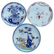 Three Lowestoft porcelain saucers, one Redgrave type with polychrome design of bamboo and flowers, a