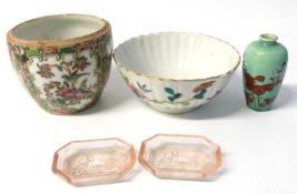 A group of Chinese porcelain wares including a Cantonese jar (cover lacking), a small green glazed