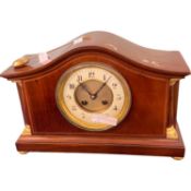 Early 20th Century serpentine shaped mantel clock with pendulum