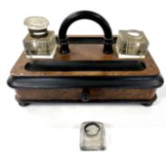 Late 19th Century desk stand with burr wood veneer and ebonised detail set with two ink wells,