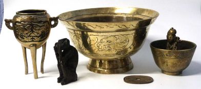 A quantity of Chinese brass wares including a Chinese bowl, further bowl raised on three feet and