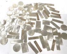 A quantity of mother of pearl counters, rectangular, oblong and round, with engraved decoration,