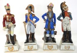 A group of four continental military figures in continental porcelain, each figure on shaped base,