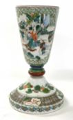 A Chinese porcelain Famille Vert vase of large goblet shape decorated with Chinese figures on a
