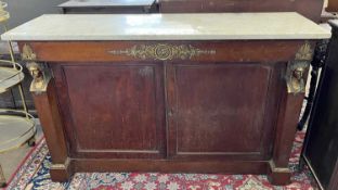A large 19th Century continental mahogany sideboard with grey marble top over a base with two