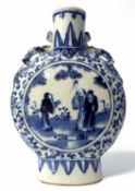 A Chinese porcelain moon flask, late Qing Dynasty with blue and white decoration in Ming style (
