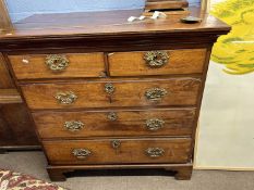 Georgian mahogany chest of two short over three long drawers fitted with elaborate swan neck handles