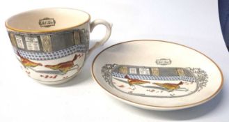A large Adams English sports breakfast cup and saucer with cock fighting design