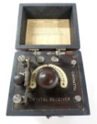 A early GPO Bijou crystal receiver set, with instructions to the interior, circa 1920