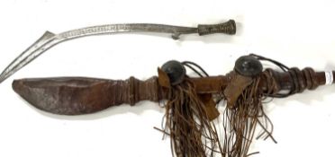 A tribal sword together with a further example in leather scabbard (2)