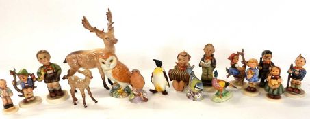 A quantity of Goebel Hummel type figures (9), together with further ceramic bird models, a Beswick