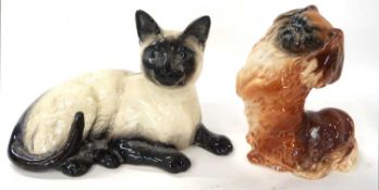 A Royal Doulton model of a Siamese Cat together with Beswick model of a King Charles Spaniel