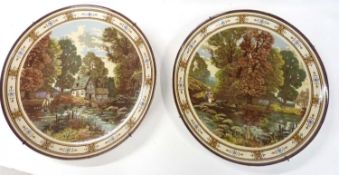 A pair of large Minton 19th Century charges decorated with pastoral scenes, after W S Coleman,