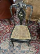 Victorian black lacquered papier mache and mother of pearl inlaid side chair with cane seat