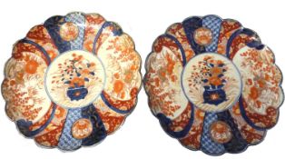A pair of Japanese Imari dishes with scalloped edge, late Meiji period, decorated in Imari style,