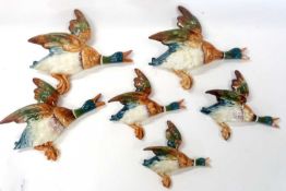A set of Beswick ducks model numbers 123 and 4, together with a further two models of Beswick ducks