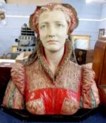 A ceramic model of a Tudor lady, probably Mary Queen of Scots, painted in period type colours on