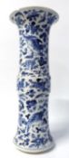 A Chinese porcelain vase in Kangxi style with blue and white decoration of birds and butterflies