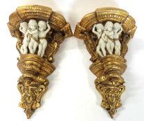 Two painted wooden wall pockets with gilt decoration and ceramic models of The Three Graces, 44cm