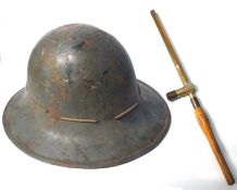 First World War helmet together with a trench periscope by R & J Beck No 28649 dated 1918