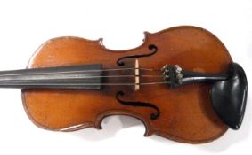 A cased antique violin with two bows, no makers label apparent, violin is 56cm long