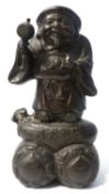 A Chinese bronze of Hoti, 20cm high