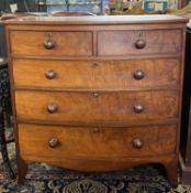 19th Century mahogany bow front chest of two short over three long drawers and set with turned