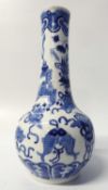 Chinese porcelain vase in Kangxi style decorated with auspicious objects, 20cm high (glaze flake