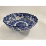 Japanese porcelain bowl of fluted shape with blue and white design of children amongst flowers, 18cm
