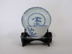 Chinese porcelain blue and white tea bowl from the Nanking Cargo sale at Christies with Christies