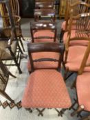 A set of four 19th Century mahogany rope and bar back dining chairs set on turned front legs