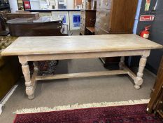 20th Century continental limed oak dining table of rectangular form set on heavy turned legs with