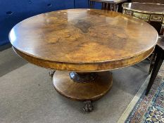 19th Century walnut veneered dining table with circular top over a bulbous column and circular