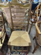 An Arts & Crafts style rush seat ladder back chair, 100cm high