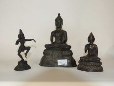 Bronze model of the Buddha Shakaymuni together with a smaller example and further Hindu Deity, the