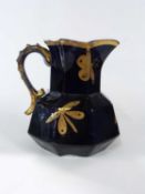 Late 19th Century iron stone jug, probably Masons, the blue ground with gilt decoration of