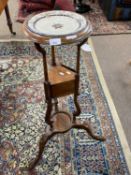 Small Georgian wash stand with circular top, a single centre drawer with two dummy drawer fronts