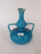 Turquoise glazed vase with loop or angular handles, the base possibly impressed mark for