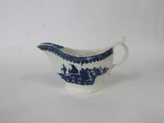Large 18th Century Caughley sauce boat with blue printed design of the fisherman with angler