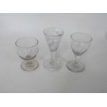 Collection of three wine glasses in 18th Century style one with trumpet bowl with an engraving and