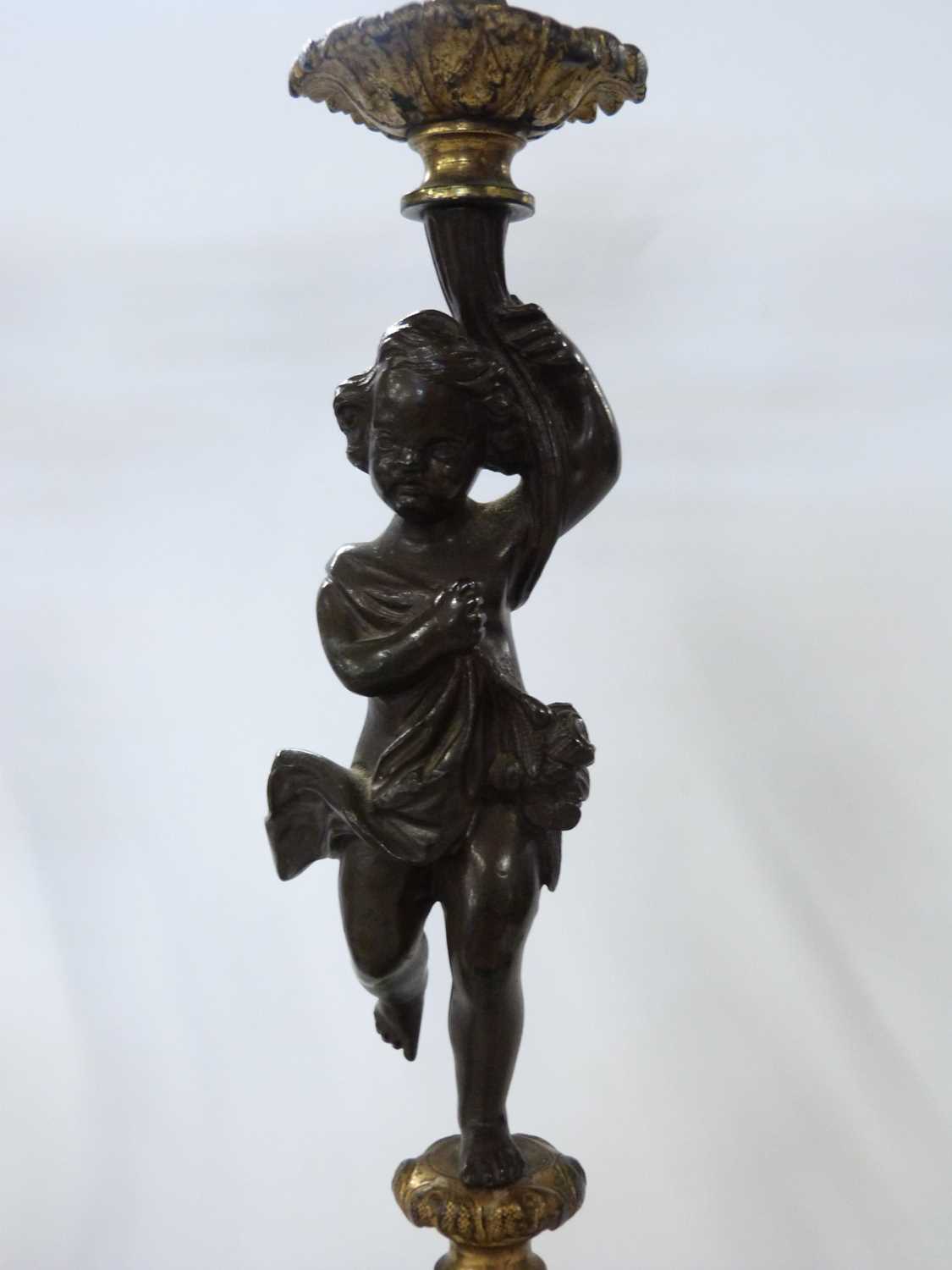 Pair of candelabra in French Empire style the four branch candelabra supported by a bronzed cherub - Image 2 of 6