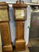 Georgian long case clock with unsigned floral painted dial, with an eight day movement, set in a oak