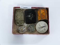 Small box containing a number of mainly vesters, also small compass and athletics medal