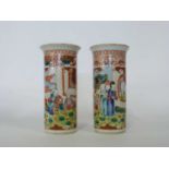Pair of 19th Century Cantonese porcelain cylindrical vases decorated in typical fashion with figures
