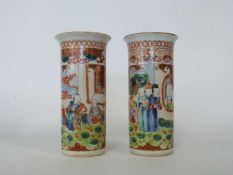 Pair of 19th Century Cantonese porcelain cylindrical vases decorated in typical fashion with figures
