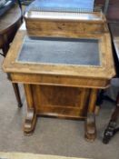 Victorian walnut veneered Davenport desk of typical form, the top section with brass gallery and