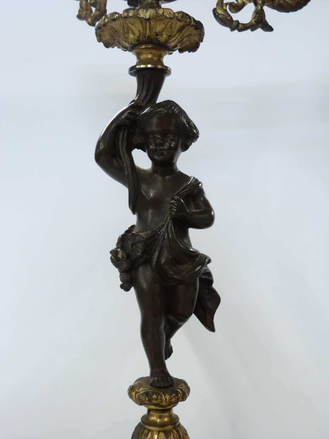 Pair of candelabra in French Empire style the four branch candelabra supported by a bronzed cherub - Image 3 of 6